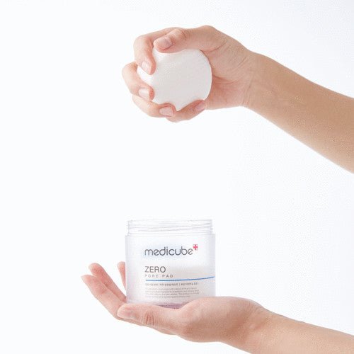 medicube Zero Pore Pad 2.0 70ea container held open with white pad showing pore tightening skincare benefit