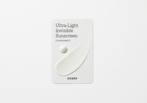 White card displaying smooth sunscreen cream texture and text highlighting ultra-light invisible formula with broad protection