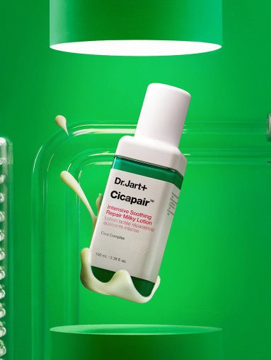 Dr.Jart+ Cicapair Intensive Soothing Repair Milky Lotion 100ml bottle with milky lotion splash on vibrant green background