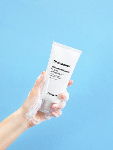 Dr.Jart+ Dermaclear pH Foam Cleanser 120ml held with foam on hand for thorough cleansing and gentle skincare.