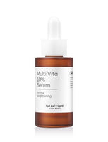 Amber dropper bottle of brightening serum with white label and minimalist text on a white background