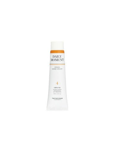 Tube of vegan hand cream with clean white and orange design offering long-lasting moisture benefits