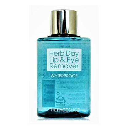Transparent blue bottle of gentle waterproof lip and eye makeup remover with silver cap on white background