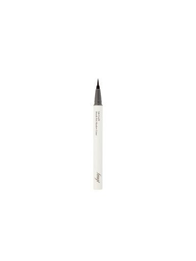 Slim pen-style eyeliner with fine brush tip designed for natural finish application on white background
