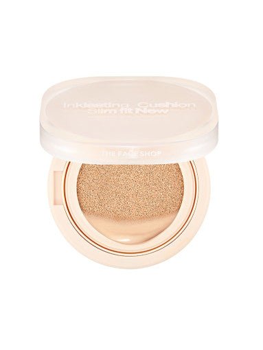 Open compact of slim fit cushion foundation with beige sponge applicator and light beige casing on white background