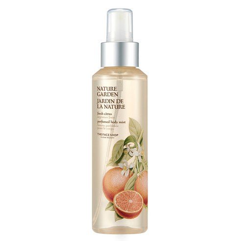Clear spray bottle of lightweight fresh citrus body mist featuring grapefruit illustration on label