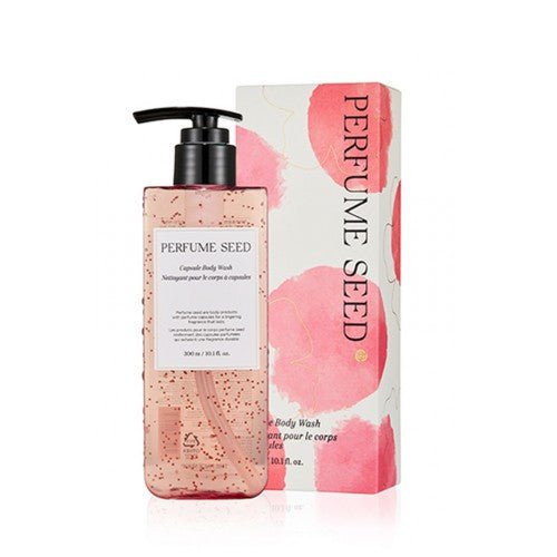 Clear pink body wash bottle with black pump and matching floral patterned box labeled Perfume Seed Capsule Body Wash