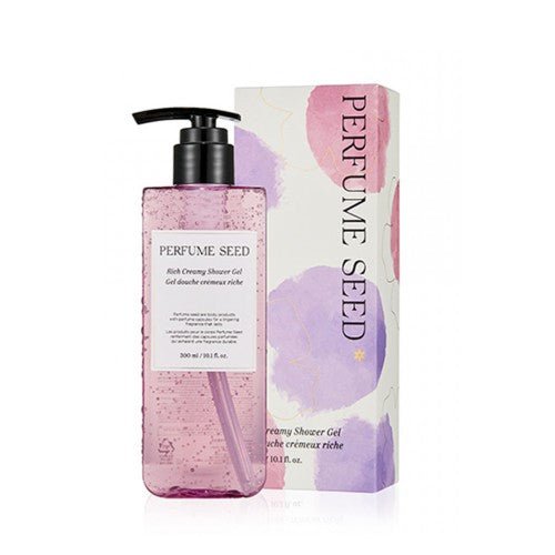 Transparent pink pump bottle of creamy shower gel with scattered bubbles beside pastel watercolor box packaging