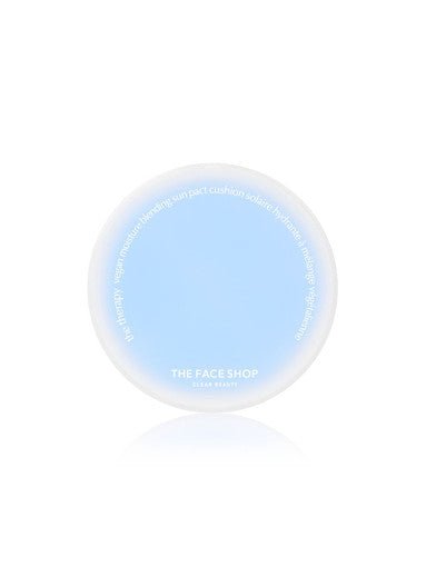 Round light blue sun pact compact with white rim labeled THE FACE SHOP for UV protection and moisture blending