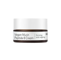 Brown jar with white lid of firming vegan mucin peptide cream labeled anti-aging and moisturizing benefits