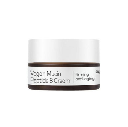 Brown jar with white lid of firming vegan mucin peptide cream labeled anti-aging and moisturizing benefits