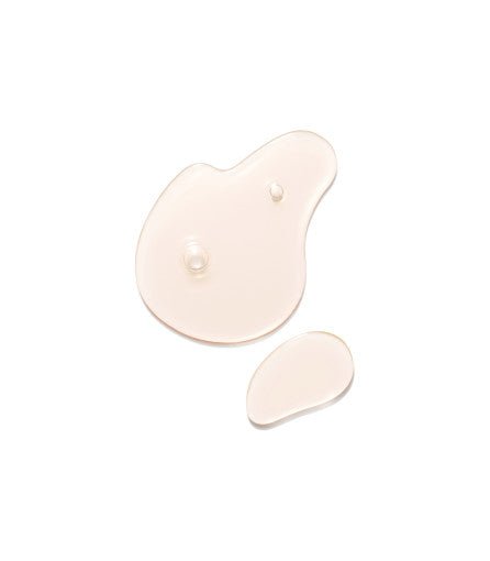 Clear serum droplets with a smooth texture showing collagen-boosting rejuvenating properties on white background