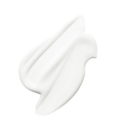 Smooth white emulsion texture showcasing a rich, nourishing anti-aging skin treatment with a creamy consistency