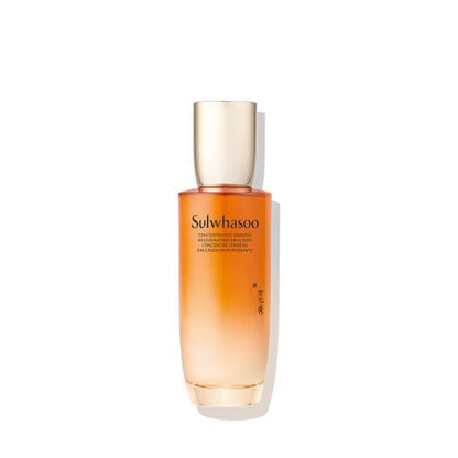 Tall gradient amber glass bottle of rejuvenating emulsion with gold cap, highlighting anti-aging skincare benefits
