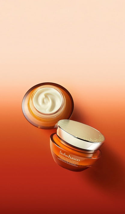 Open amber jar of rich cream with silver lid on warm gradient background suggesting luxury skincare benefits