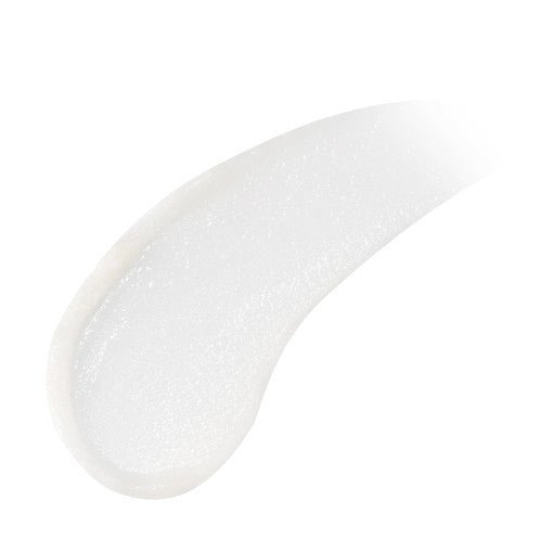 Smooth, glossy swatch of translucent lip balm with moisturizing texture highlighting 24-hour hydration benefit
