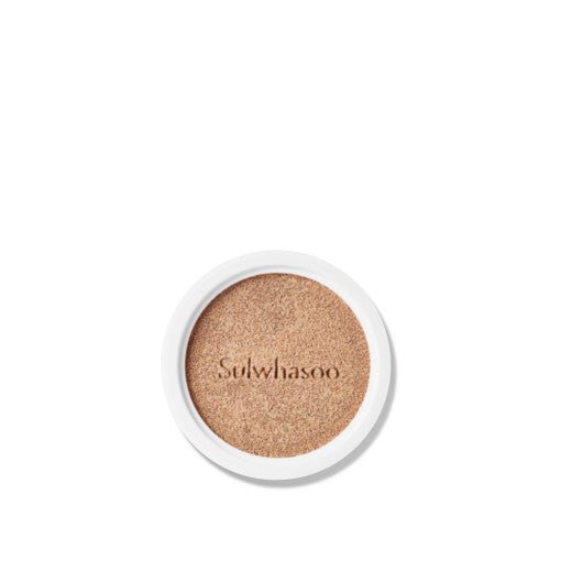 Round cushion refill compact with natural finish foundation embossed with brand name on white background