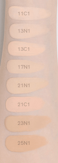 Eight skin tone swatches ranging from light to medium beige shades for natural finish cushion makeup.