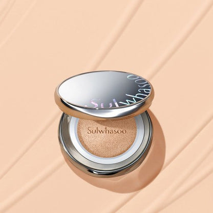 Open silver compact cushion foundation with natural-finish beige cushion on peach background