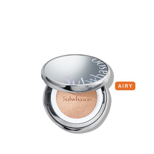 Open silver compact cushion foundation with radiant finish visible on beige sponge applicator labeled airy shade