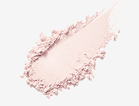 Light pink loose powder swatch with a finely milled texture, showcasing a smooth finish effect.