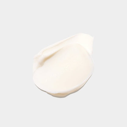 Smooth creamy white texture of hydrating skin cream promoting youthful appearance