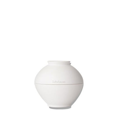 Minimalist white jar of cream with smooth matte finish, designed for promoting youthful skin appearance.