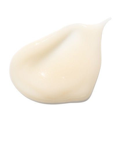 Creamy pale beige serum texture with smooth, rich consistency highlighting multi-function skincare benefits