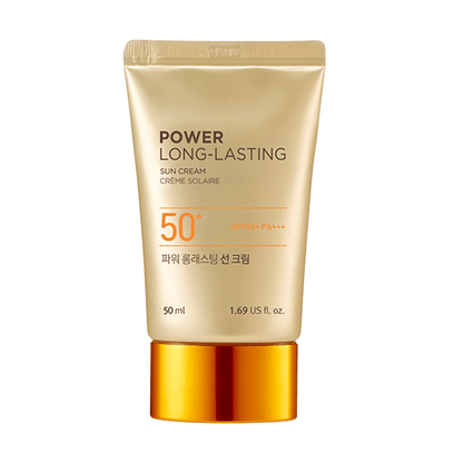 Gold-toned tube of long-lasting sun cream with SPF50+ and broad spectrum protection on white background