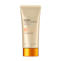 Beige tube of broad protection long-lasting sun cream with orange cap and SPF50+ PA+++ label on white background