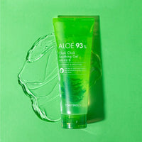 Green translucent tube of aloe soothing gel with clear gel spread on matching green surface promoting soothing relief