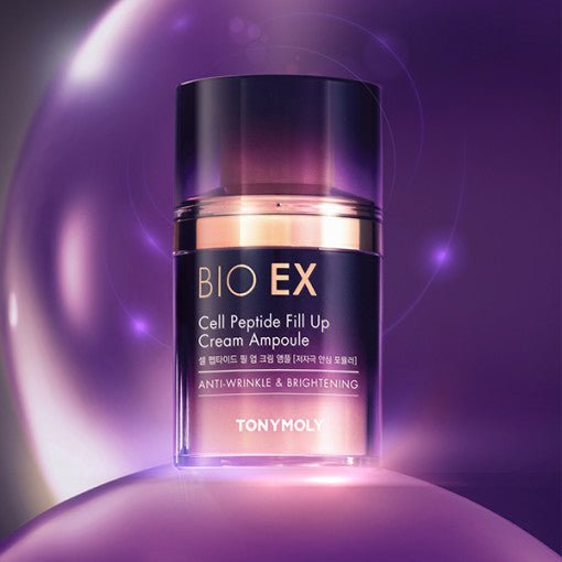 Purple gradient cream ampoule bottle with gold accents highlighting anti-wrinkle and brightening skin benefits