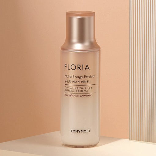 Matte frosted bottle with metallic cap containing moisturizing emulsion with argan oil and safflower extract