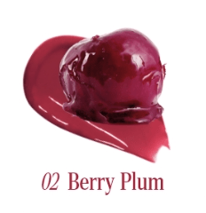 Glossy berry plum tint balm swatch with smooth, shiny texture highlighting rich, moisturizing lip color effect