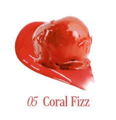Glossy coral-tinted balm swatch with smooth, shiny texture showcasing vibrant glossy finish effect