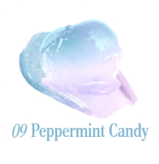 Glossy lavender-blue tint balm scoop resting on faceted hexagonal tray with “09 Peppermint Candy” label beneath