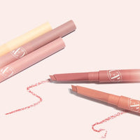 Two retractable lip liners in soft pink tones with soft crayon tips alongside closed liners on pale background