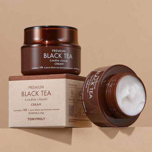Brown jar and box of brightening cream with black tea ferment extract emphasizing natural complexion glow benefits