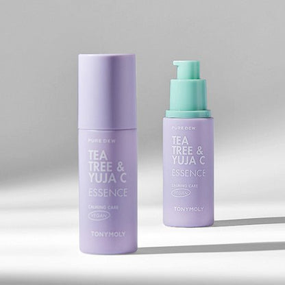 Two lavender bottles of calming essence with mint-green pump tops on a light gray background with soft shadows