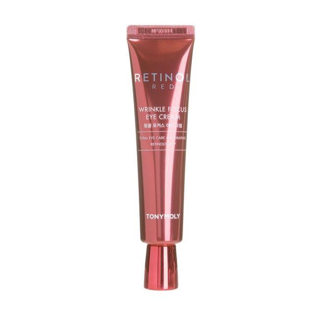 Shiny red metallic tube of retinol eye cream designed for wrinkle reduction and focused care around the eyes