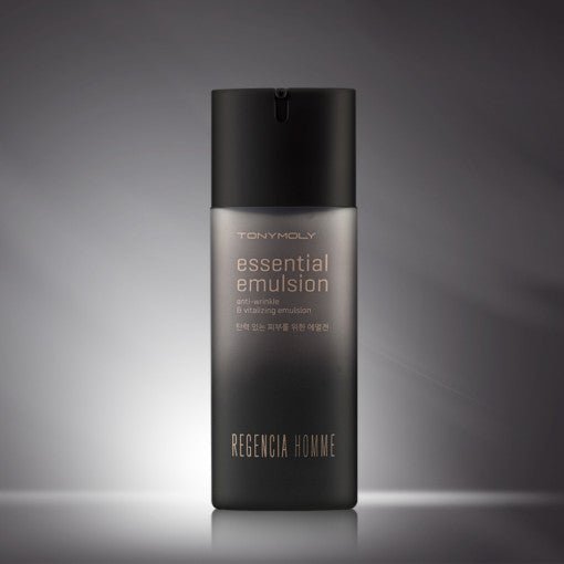 Matte black and gray bottle of essential emulsion with minimalist label design on soft gradient background