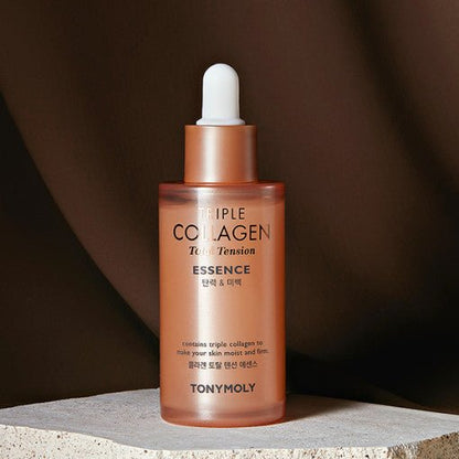 Frosted amber dropper bottle of collagen essence standing on textured stone with warm brown background