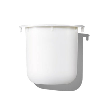 Minimalist white refill container for skincare cream with smooth matte finish casting soft shadow