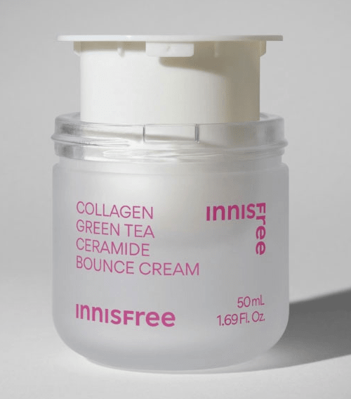 Frosted jar of collagen and green tea cream with white pump dispenser emphasizing elasticity boost benefits