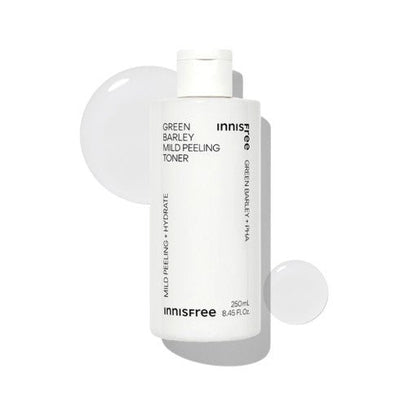White bottle of mild peeling toner with clear liquid droplets highlighting gentle exfoliation and hydration benefits