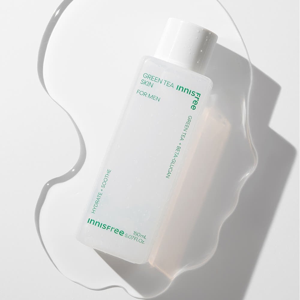 Clear bottle of innisfree hydration boost skin for men with green text on white background and water splash effect