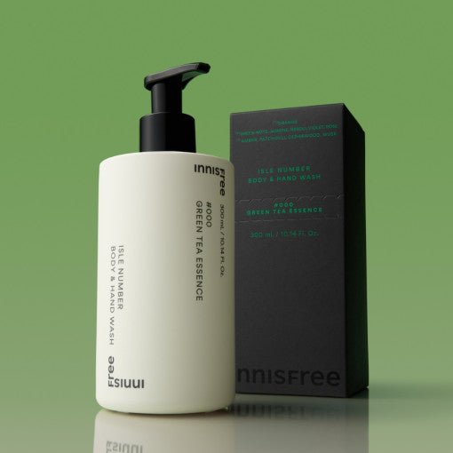 Matte white pump bottle of body and hand wash with black box packaging showcasing green tea essence hydration boost benefits