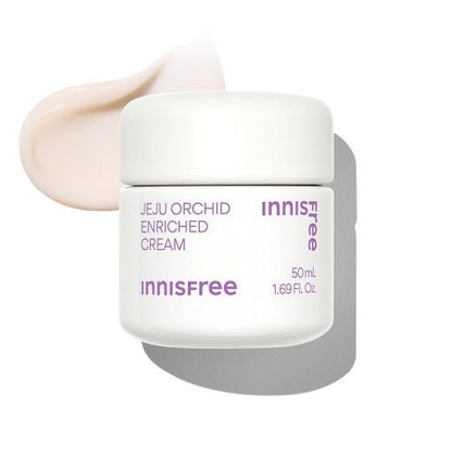 White jar of enriched cream with purple text beside smooth light beige cream swatch on white background