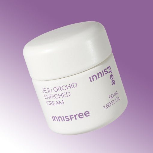 White jar of innisfree orchid enriched cream with purple text on a soft purple gradient background