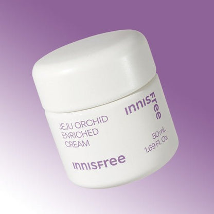 White jar of innisfree orchid enriched cream with purple text on a soft purple gradient background